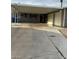 Front exterior of home with a covered carport and wide driveway for easy parking at 5804 Balzar Ave, Las Vegas, NV 89108