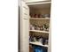 A well-organized pantry, with shelves stocked with various food items and household supplies at 5804 Balzar Ave, Las Vegas, NV 89108