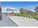 Beautiful outdoor living space featuring patio, outdoor kitchen, and landscaped backyard at 6184 Willow Rock St, Las Vegas, NV 89135