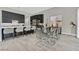 Elegant dining area featuring a glass table, modern chairs, and stylish decor at 6184 Willow Rock St, Las Vegas, NV 89135