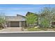 Beautiful single-story home with desert landscaping and a stone facade at 6184 Willow Rock St, Las Vegas, NV 89135