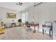 Bright and spacious garage space with light hardwood floors and a large painting at 6184 Willow Rock St, Las Vegas, NV 89135