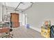 Spacious garage with epoxy floors and natural light coming from the back door at 6184 Willow Rock St, Las Vegas, NV 89135