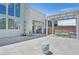 Backyard featuring an outdoor kitchen with a built-in grill and ample patio space at 6184 Willow Rock St, Las Vegas, NV 89135