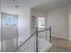 Bright entryway featuring a large arched window and a staircase with a white railing at 6235 Westwind Rd, Las Vegas, NV 89118