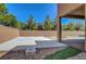 View of the backyard and patio area, showing low-maintenance gravel landscaping at 7380 Abundant Harvest Ave, Las Vegas, NV 89131