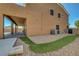 Covered patio with rocks, artificial grass and mountain views at 7380 Abundant Harvest Ave, Las Vegas, NV 89131
