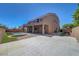 Exterior of the two-story home with a spacious backyard, perfect for entertaining at 7380 Abundant Harvest Ave, Las Vegas, NV 89131