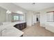 Primary bathroom featuring double sinks, ample counter space, and natural light at 7380 Abundant Harvest Ave, Las Vegas, NV 89131