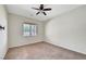 Bedroom with a window and carpet flooring at 7380 Abundant Harvest Ave, Las Vegas, NV 89131