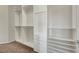 Walk-in closet offering extensive storage with built-in shelving and drawers at 7380 Abundant Harvest Ave, Las Vegas, NV 89131