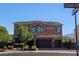Beautiful two-story home with well-maintained landscaping and a three-car garage at 7380 Abundant Harvest Ave, Las Vegas, NV 89131