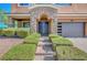Charming home featuring a stone facade, well-maintained landscaping, and a welcoming front entrance at 7380 Abundant Harvest Ave, Las Vegas, NV 89131