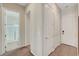 Hallway with carpet and white doors at 7380 Abundant Harvest Ave, Las Vegas, NV 89131