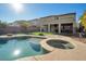 Backyard with a sparkling pool and spa, perfect for relaxation and outdoor enjoyment at 7520 Fontera Ct, Las Vegas, NV 89139
