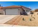Charming single-story home with a well-maintained front yard and a two-car garage in a residential community at 7728 Barbican Ct, Las Vegas, NV 89147