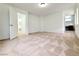 Spacious bedroom with neutral carpet, white walls and natural light at 7863 Warwickshire Way, Las Vegas, NV 89139