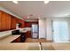 Modern kitchen features stainless steel appliances and wood cabinets at 7863 Warwickshire Way, Las Vegas, NV 89139