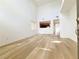 Open concept living room with soaring ceilings and beautiful wood floors at 7863 Warwickshire Way, Las Vegas, NV 89139
