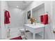 Clean bathroom with a glass-enclosed shower, modern vanity, large mirror, and sleek fixtures at 7988 Harbour Towne Ave, Las Vegas, NV 89113
