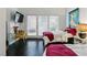 Cozy bedroom featuring twin bed, desk with a chair, large window and plenty of natural light at 7988 Harbour Towne Ave, Las Vegas, NV 89113
