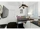 Cozy breakfast nook featuring a wooden table and comfortable bench seating at 7988 Harbour Towne Ave, Las Vegas, NV 89113
