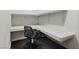 Bright office space with dark wood floors, built-in desk, and a rolling office chair at 7988 Harbour Towne Ave, Las Vegas, NV 89113