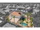 Aerial view of a beautiful home with a sparkling pool, verdant turf, and a private backyard oasis at 8320 Deer Springs Way, Las Vegas, NV 89149