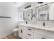 Modern bathroom features dual sinks, square mirrors, and updated fixtures at 8320 Deer Springs Way, Las Vegas, NV 89149