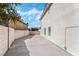 Spacious concrete driveway and side yard of this home providing ample parking space at 8320 Deer Springs Way, Las Vegas, NV 89149