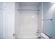 Bathroom featuring tub with shower and single sink vanity, neutral paint and tile at 8555 W Russell Rd # 2020, Las Vegas, NV 89113