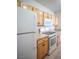 Charming kitchen featuring wooden cabinets and modern appliances at 8555 W Russell Rd # 2020, Las Vegas, NV 89113