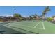 Well-maintained outdoor tennis court, perfect for enjoying recreational activities in a community setting at 8836 Martin Downs Pl, Las Vegas, NV 89131