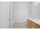Bright bathroom with white cabinets, tub, shower, and neutral-colored floor at 8985 S Durango Dr # 1154, Las Vegas, NV 89113