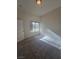 Bedroom with large window allowing natural light, neutral walls, and plush carpet at 8985 S Durango Dr # 1154, Las Vegas, NV 89113