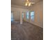 Bright bedroom with a ceiling fan, neutral walls, and mirrored closet doors at 8985 S Durango Dr # 1154, Las Vegas, NV 89113