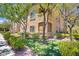 Inviting exterior showcasing the building's facade, landscaping, and serene surroundings at 8985 S Durango Dr # 1154, Las Vegas, NV 89113