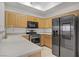 Well-lit kitchen showcases modern stainless steel appliances and sleek countertops at 8985 S Durango Dr # 1154, Las Vegas, NV 89113