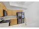 Kitchen featuring stainless steel appliances, ample cabinetry, and a double basin sink at 8985 S Durango Dr # 1154, Las Vegas, NV 89113