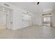 Spacious living room with tile flooring, ceiling fan, and slider to the patio at 8985 S Durango Dr # 1154, Las Vegas, NV 89113