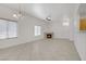 Sunlit living room with tile floors, fireplace, and bright windows at 8985 S Durango Dr # 1154, Las Vegas, NV 89113