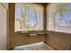 Enjoy serene views from this covered patio, complete with three small shelves for a personal touch at 8985 S Durango Dr # 1154, Las Vegas, NV 89113
