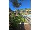 Landscaped community pool area with grass, seating, and well-maintained grounds at 8985 S Durango Dr # 1154, Las Vegas, NV 89113