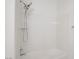 Modern shower with adjustable showerhead and white surround at 8985 S Durango Dr # 1154, Las Vegas, NV 89113