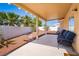 Covered patio features modern outdoor seating and minimal landscaping at 1011 Pearl Marble Ave, North Las Vegas, NV 89081