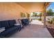 Backyard patio with outdoor sofa seating with a view of the pool at 1011 Pearl Marble Ave, North Las Vegas, NV 89081