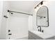 Bright bathroom with white subway tile and vanity with an undermount sink at 1011 Pearl Marble Ave, North Las Vegas, NV 89081