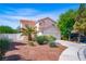 Charming two-story home featuring a well-maintained front yard and a two-car garage at 1011 Pearl Marble Ave, North Las Vegas, NV 89081