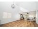 Living room with modern lighting, hardwood floors, and neutral paint colors at 1011 Pearl Marble Ave, North Las Vegas, NV 89081