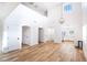 Spacious living area with hardwood floors, soaring ceilings, and ample natural light at 1011 Pearl Marble Ave, North Las Vegas, NV 89081